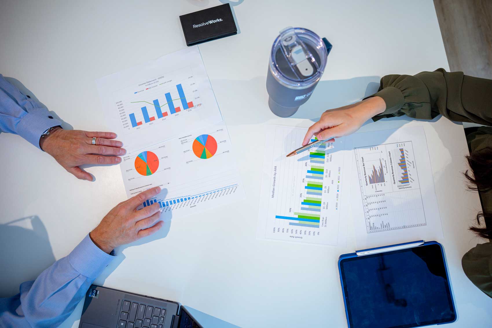 4O6A0488 person pointing at income statement