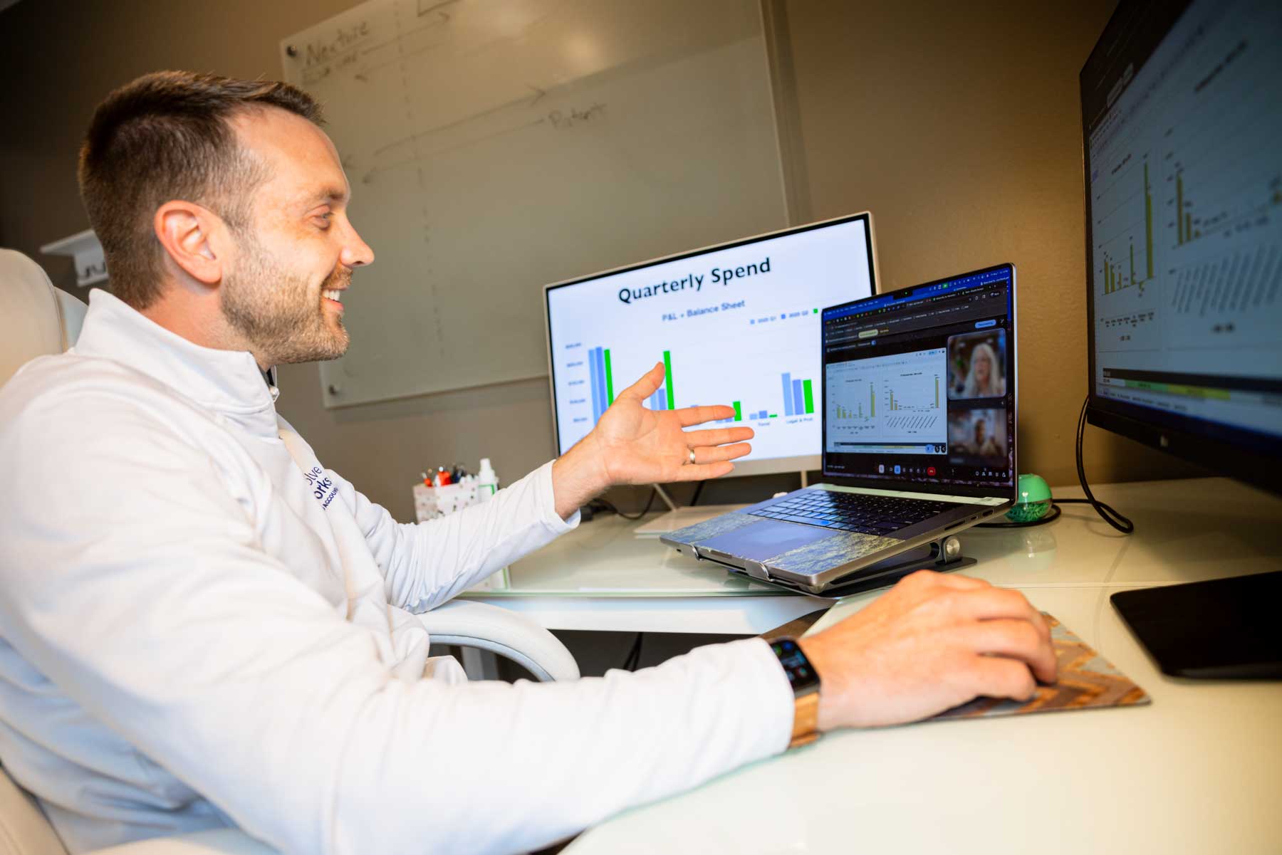 accountant with client reviewing quarterly spend