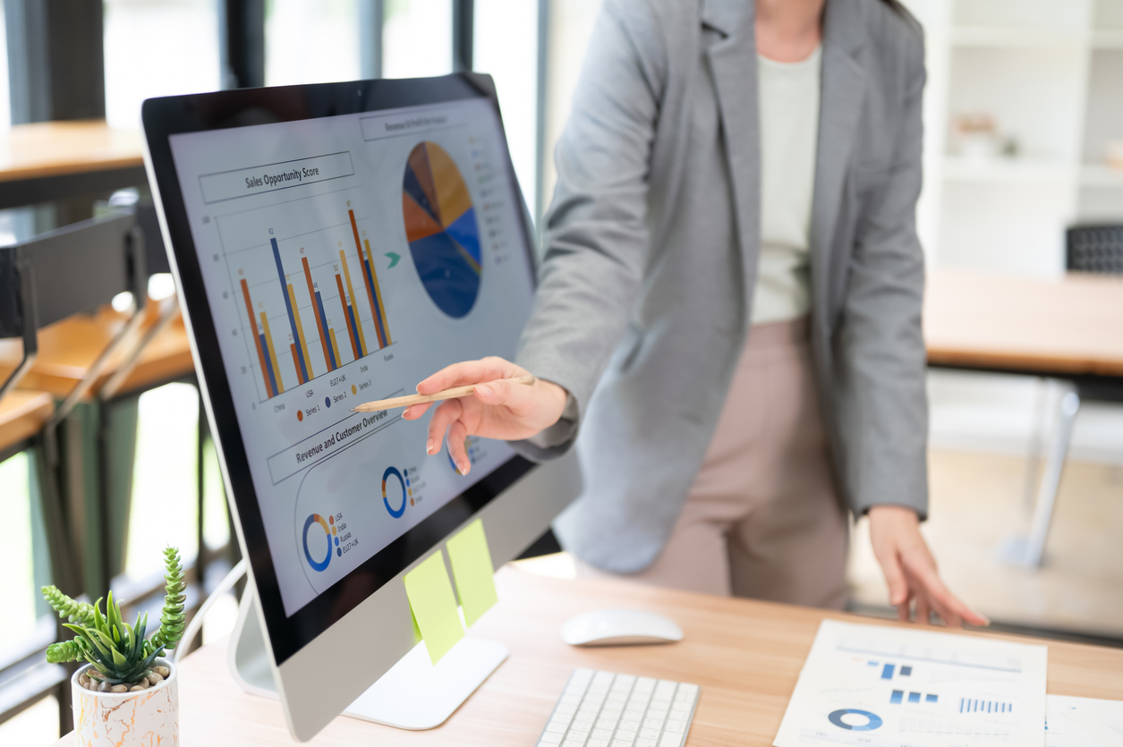 Controller presenting financial statements to a business owner as part of controllership services