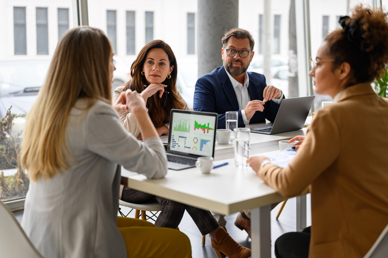 Accountant presenting monthly financial statements to a company leadership team
